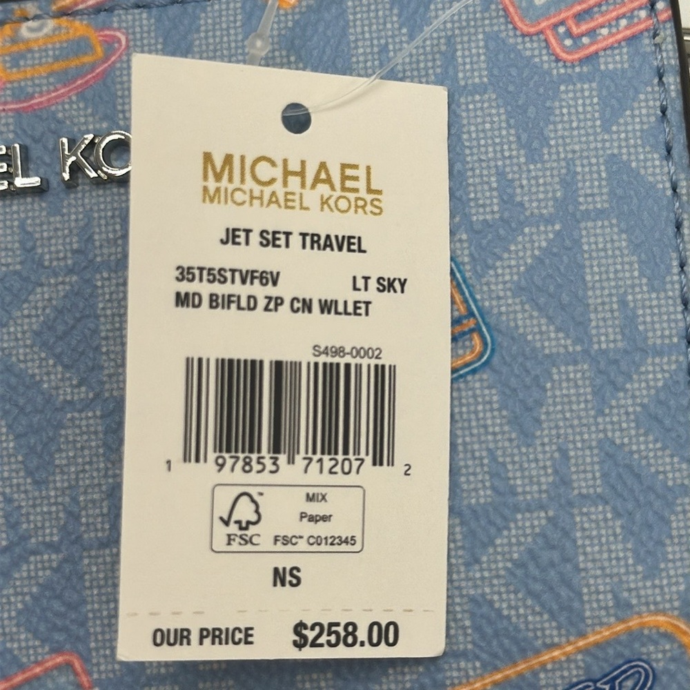 Michael Kors Jet Set Travel Medium Printed Signature Logo Bi-Fold Wallet
LT SKY - Picture 16 of 16